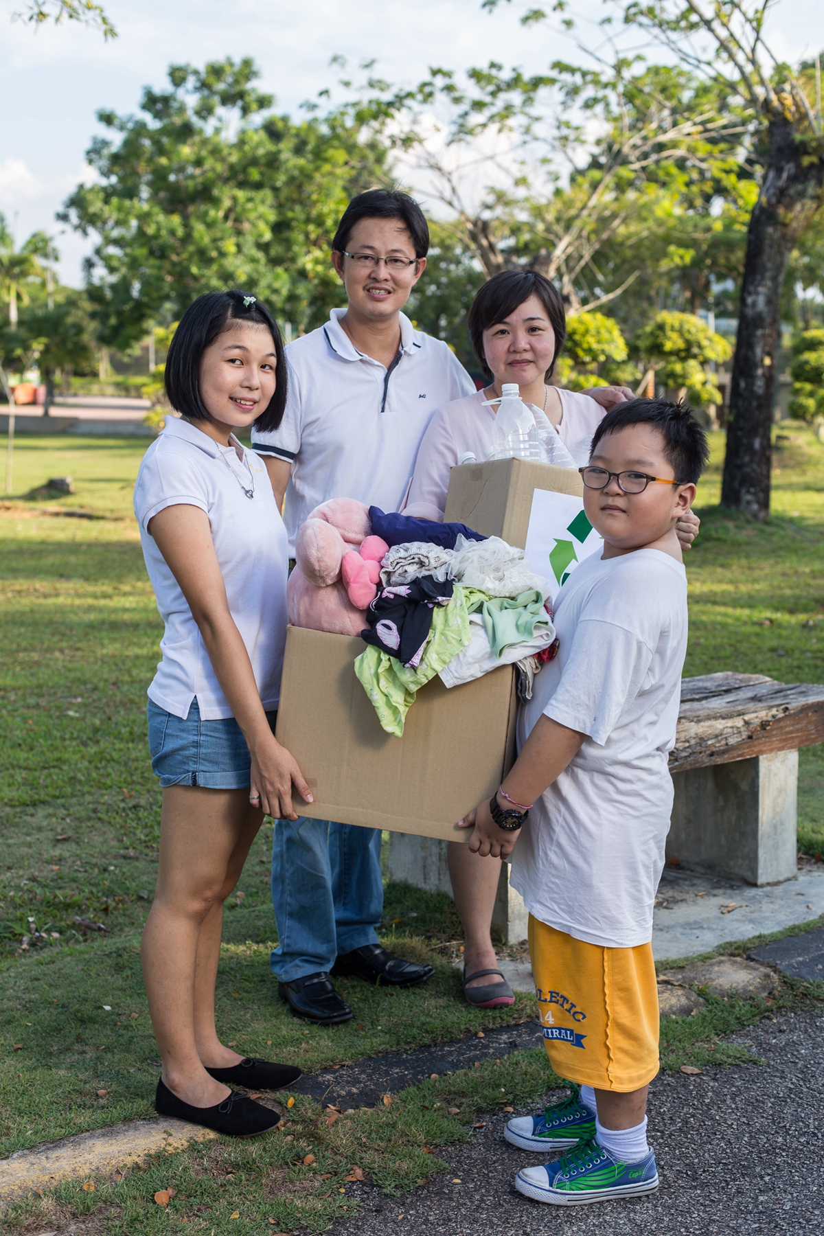Family donating textiles